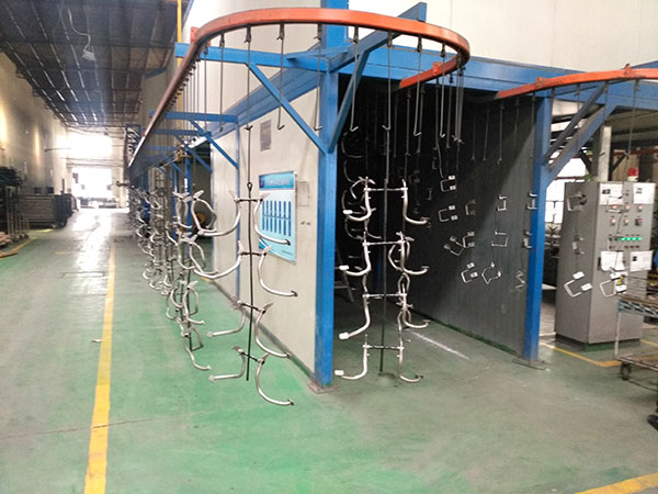 Powder spraying line